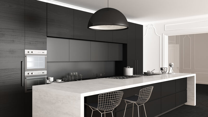 Matte black cupboards in a new kitchen