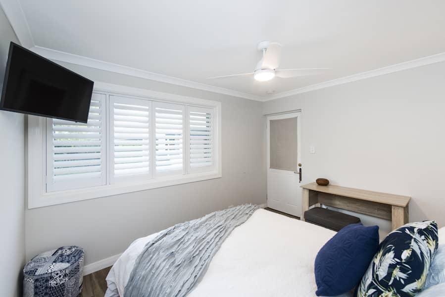 A fully renovated bedroom on display for Perth Renovations Co.