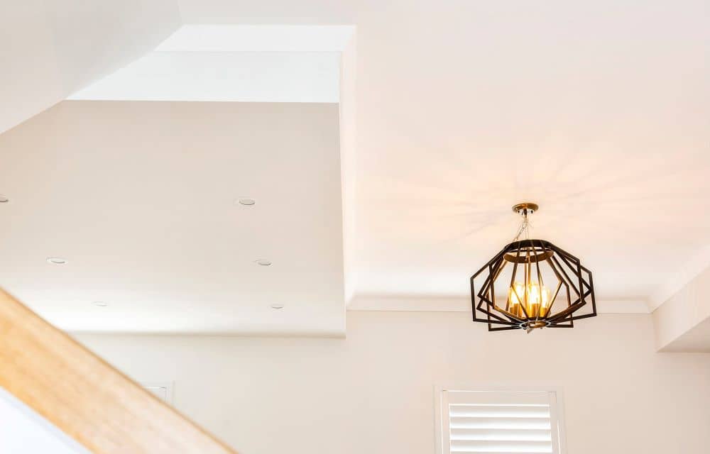 Newly renovated kitchen with pendant light.