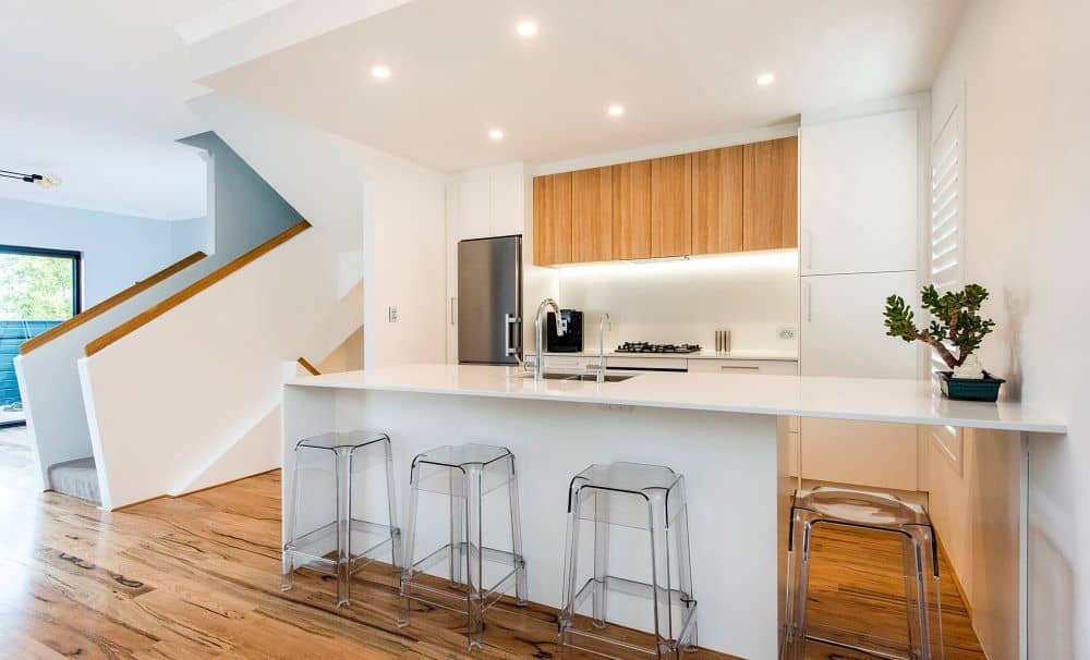 Kitchen islands are not out, but pros recommend that you opt to make it as minimal as possible.